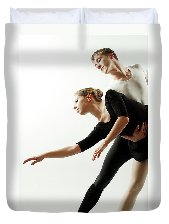 Young Men Duvet Cover featuring the photograph Couple Dancing Ballet by Oleg66
