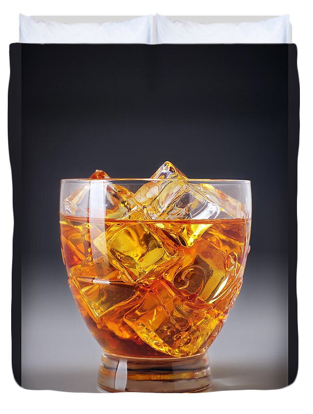 Alcohol Duvet Cover featuring the photograph Drink on ice by Carlos Caetano