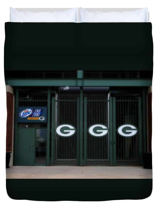 End Zone Duvet Cover featuring the photograph End Zone Gates At Lambeau Field by Kay Novy