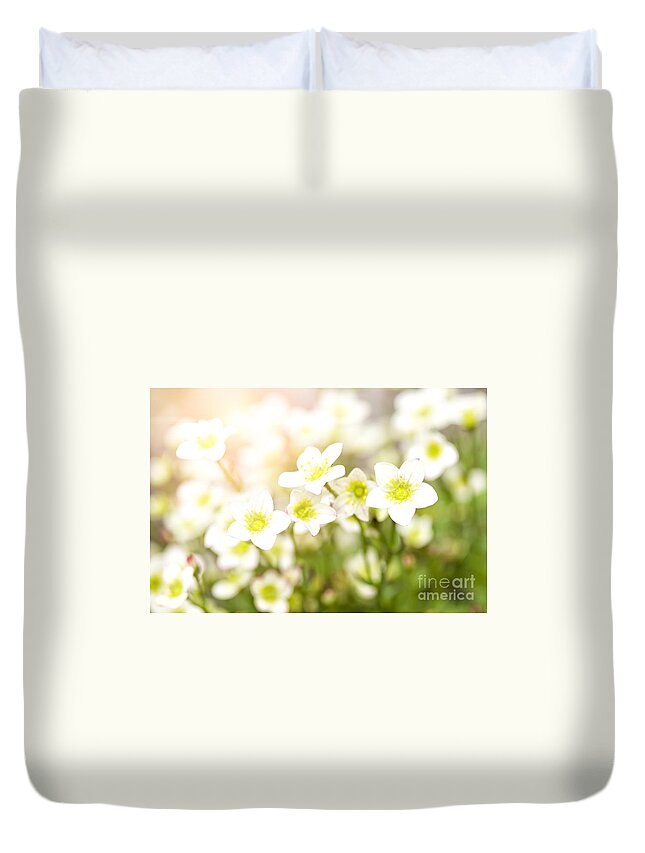 Flower Duvet Cover featuring the photograph Field of white blossoms by Sophie McAulay