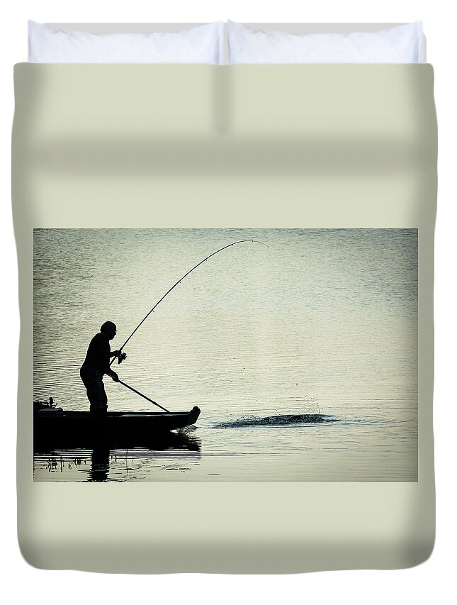 Fisher Duvet Cover featuring the photograph Fisherman Catching Fish On A Twilight Lake by Andreas Berthold