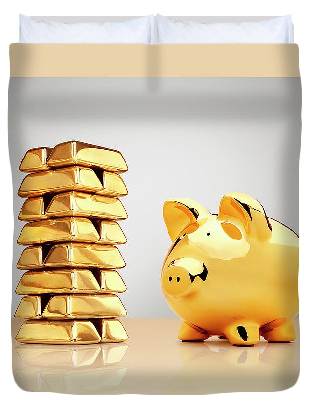 Gold Piggy Bank Beside A Stack Of Ingots by Anthony Bradshaw