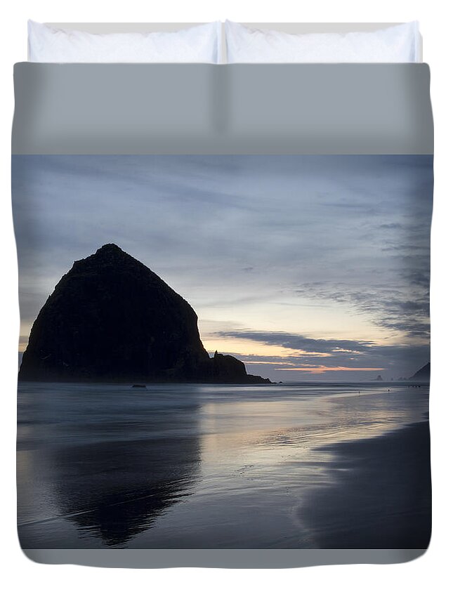 Haystack Duvet Cover featuring the photograph Haystack Rock on Cannon Beach Oregon Evening by David Gn