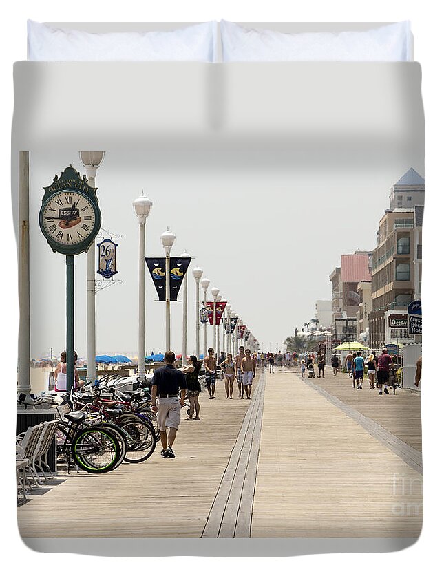 Atlantic Duvet Cover featuring the photograph Heat waves make the boardwalk shimmer in the distance by William Kuta