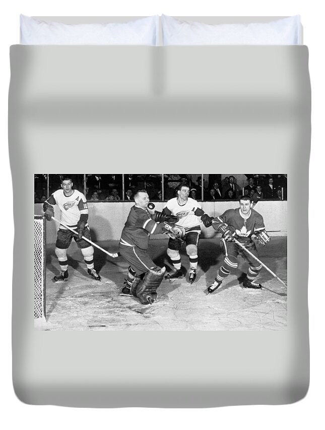 1950s Duvet Cover featuring the photograph Hockey Goalie Chin Stops Puck by Underwood Archives