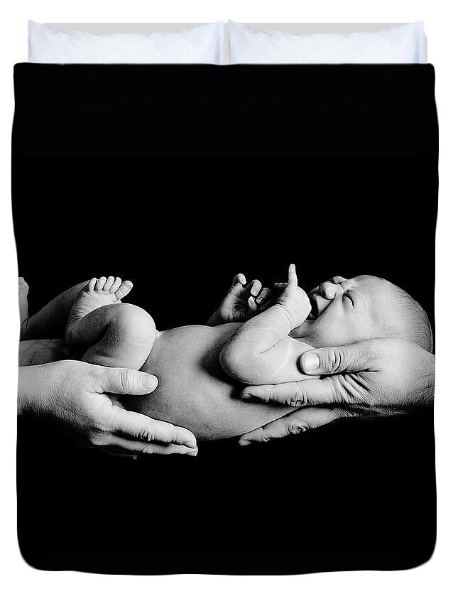 Newborn Duvet Cover featuring the photograph In Your Hands by Sebastian Musial