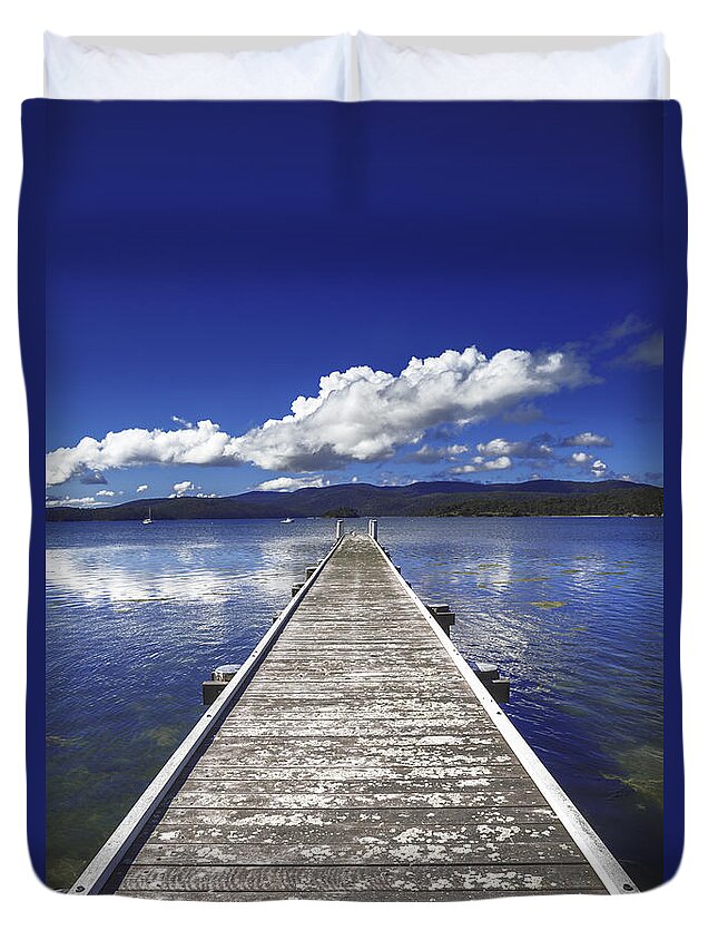Pier Duvet Cover featuring the photograph Into the Blue by Anthony Davey