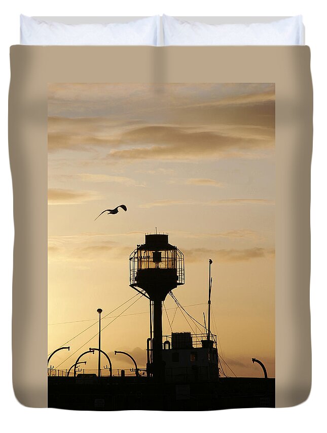 Light Duvet Cover featuring the photograph Light ship silhouette at sunset by Steve Ball