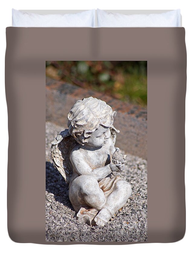 Angel Duvet Cover featuring the photograph Little Angel with Bird in his Hand - Sculpture by Eva-Maria Di Bella