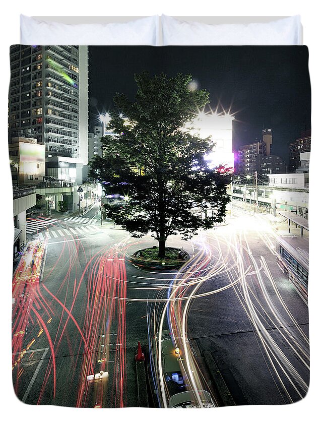 Land Vehicle Duvet Cover featuring the photograph Long Explosure Of Lights In Road by Spiraldelight