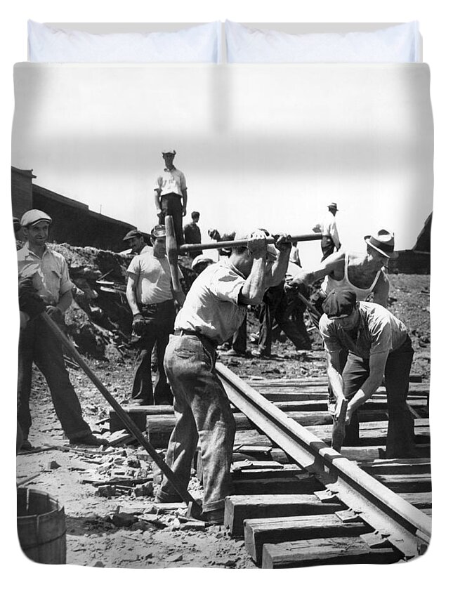 1035-1026 Duvet Cover featuring the photograph Men Laying Railroad Track by Underwood Archives