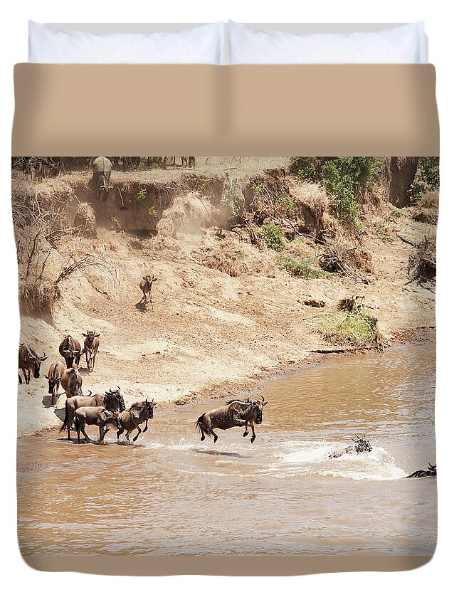 Kenya Duvet Cover featuring the photograph Migration Of The Wildebeest In The by Diane Levit / Design Pics