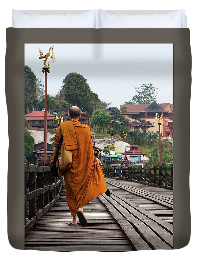 People Duvet Cover featuring the photograph Monk Walking Across Wooden Bridge by Kat Payne Photography