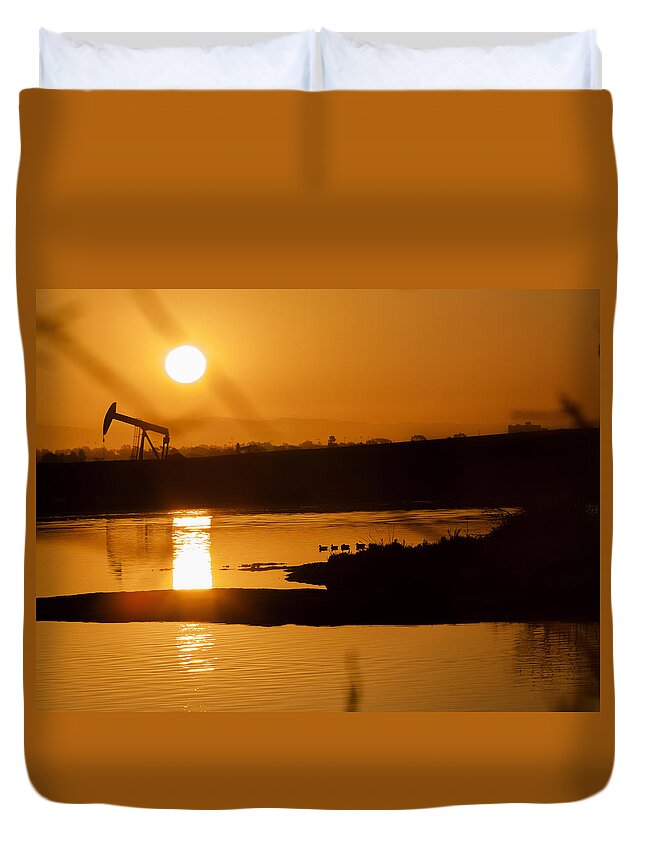 Bolsa Chica Duvet Cover featuring the photograph Oil Sunrise and Gold by Denise Dube