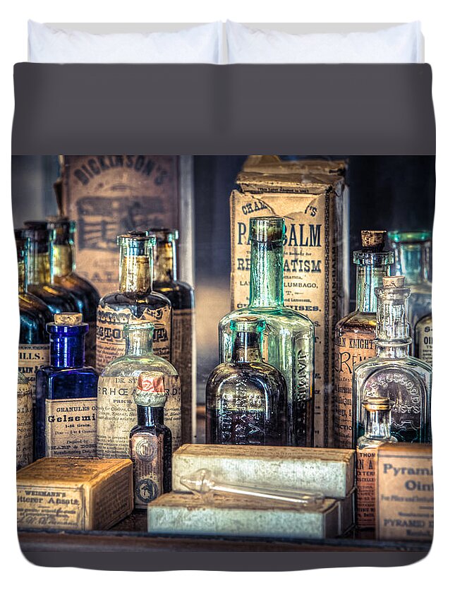 Chemists Duvet Cover featuring the photograph Ointments Tonics and Potions - A 19th Century Apothecary by Gary Heller