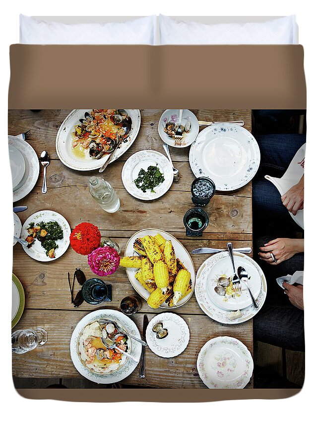People Duvet Cover featuring the photograph Overhead View Of Friends Dining Mid-meal by Thomas Barwick