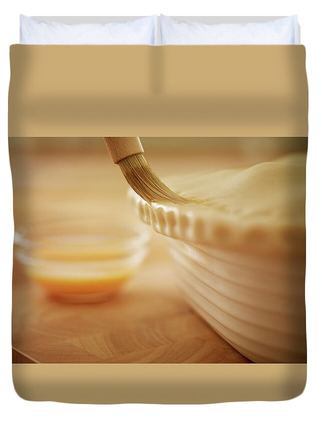 Baked Pastry Item Duvet Cover featuring the photograph Pastry Being Brushed With Egg Wash by Adam Gault