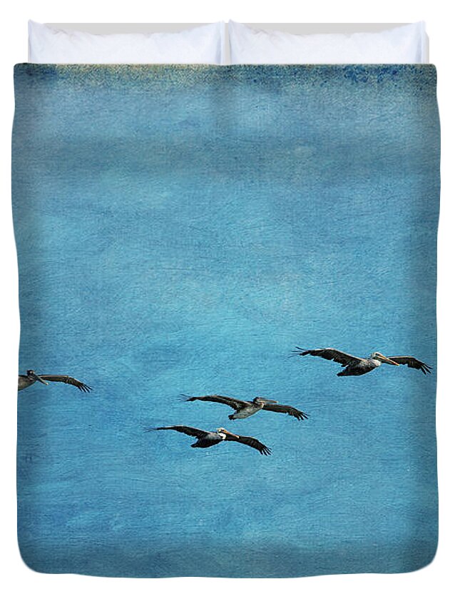 Ocean Duvet Cover featuring the photograph Pelicans In Flight by Mary Jo Allen