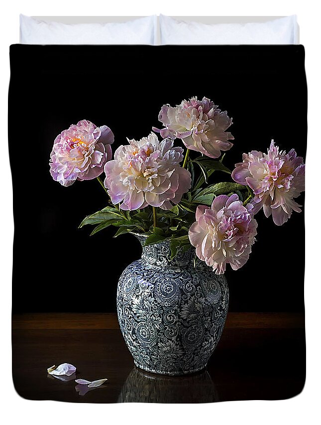 Peonies Duvet Cover featuring the photograph Peonies In A Blue Vase by Endre Balogh