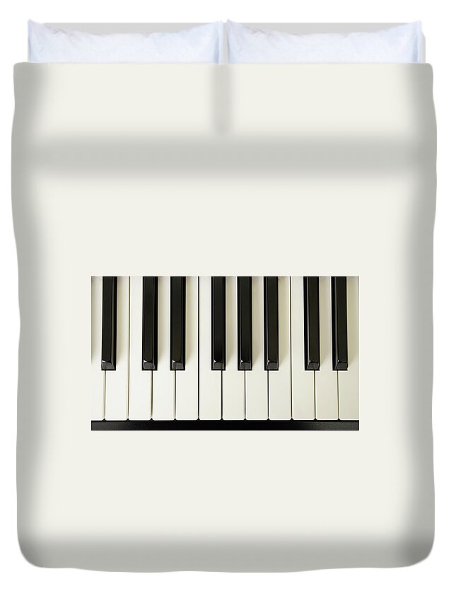 Piano Duvet Cover featuring the photograph Piano Keys by Tokenphoto