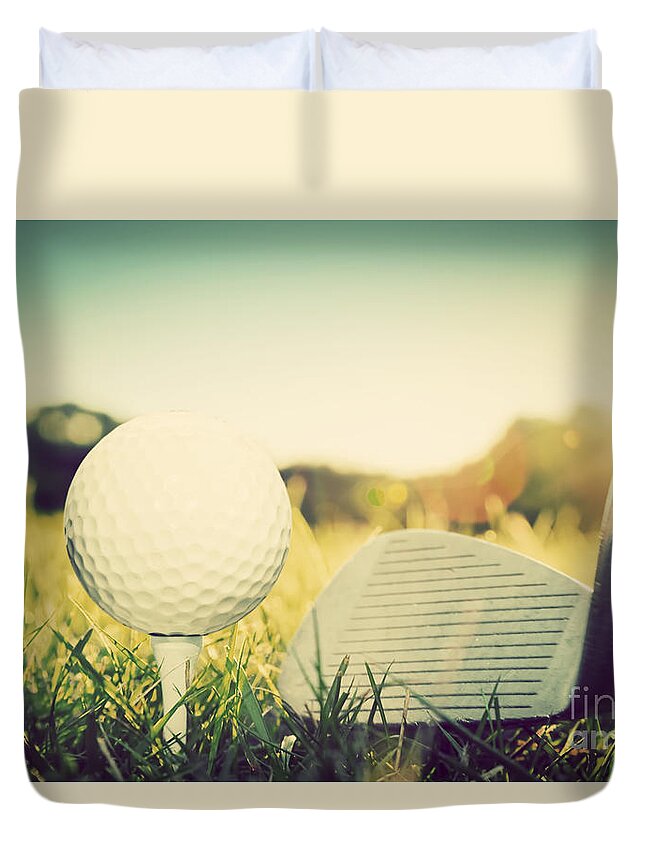 Golf ball on tee by Michal Bednarek