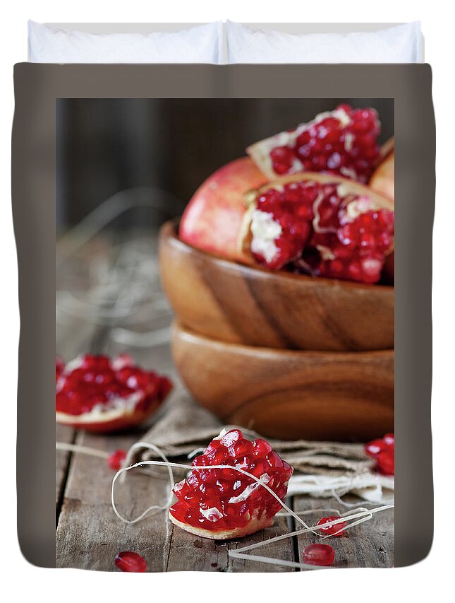 Wood Duvet Cover featuring the photograph Pomegranate by Oxana Denezhkina