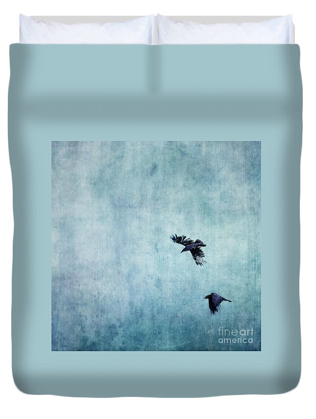 Minimalistic Duvet Cover featuring the photograph Ravens flight by Priska Wettstein