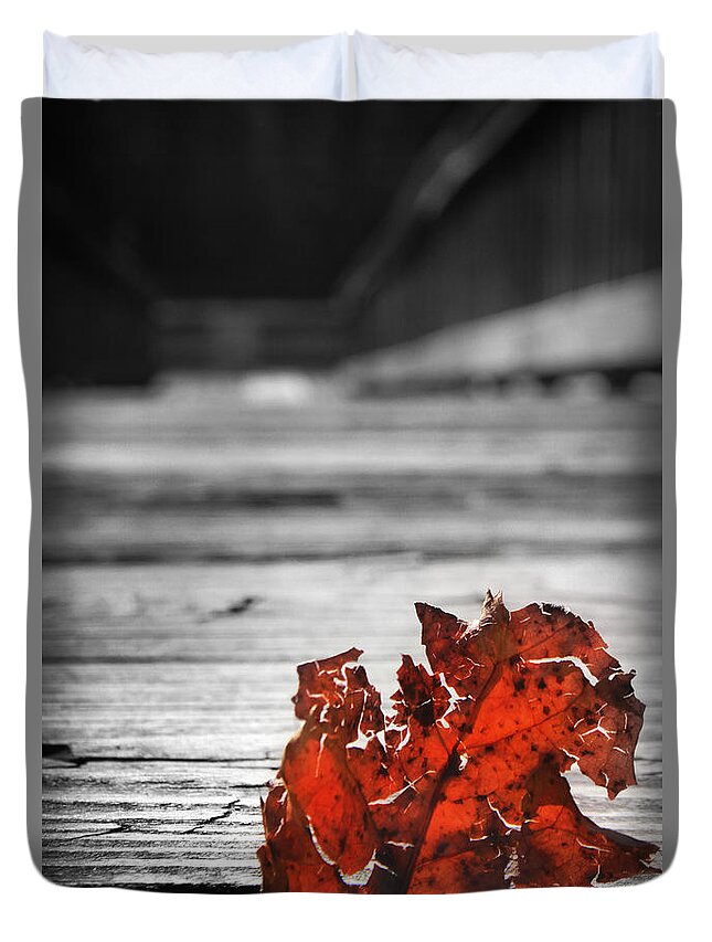 Kelly Hazel Duvet Cover featuring the photograph Red Leaf on a Pier by Kelly Hazel