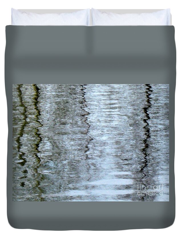 Ice Duvet Cover featuring the photograph Reflections on the ice by Pauli Hyvonen