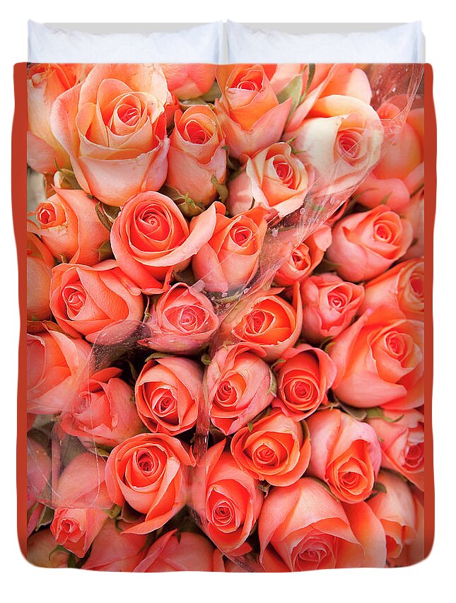 Orange Color Duvet Cover featuring the photograph Roses For Sale In A Florist by Owen Franken