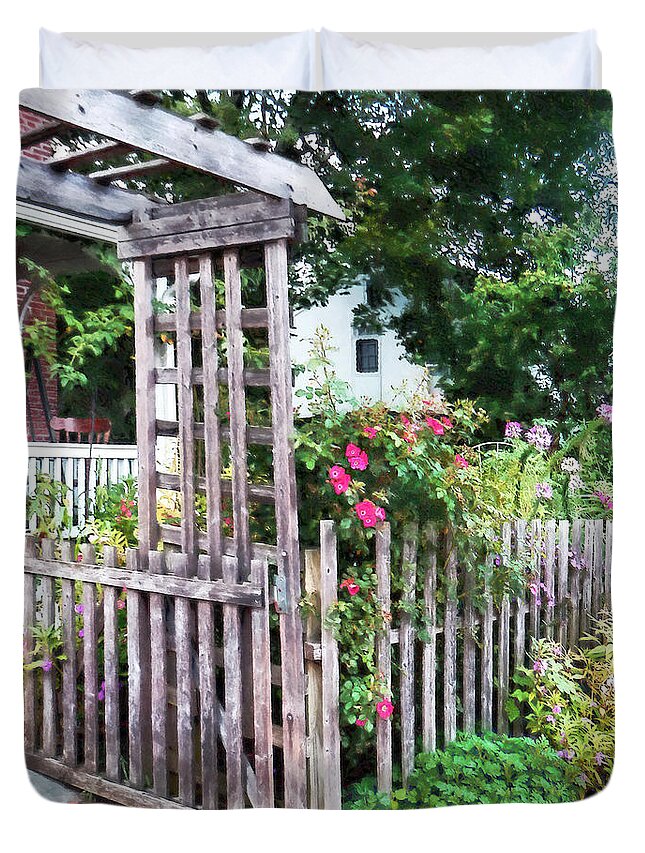 Rose Duvet Cover featuring the photograph Roses on a Weathered Picket Fence by Susan Savad