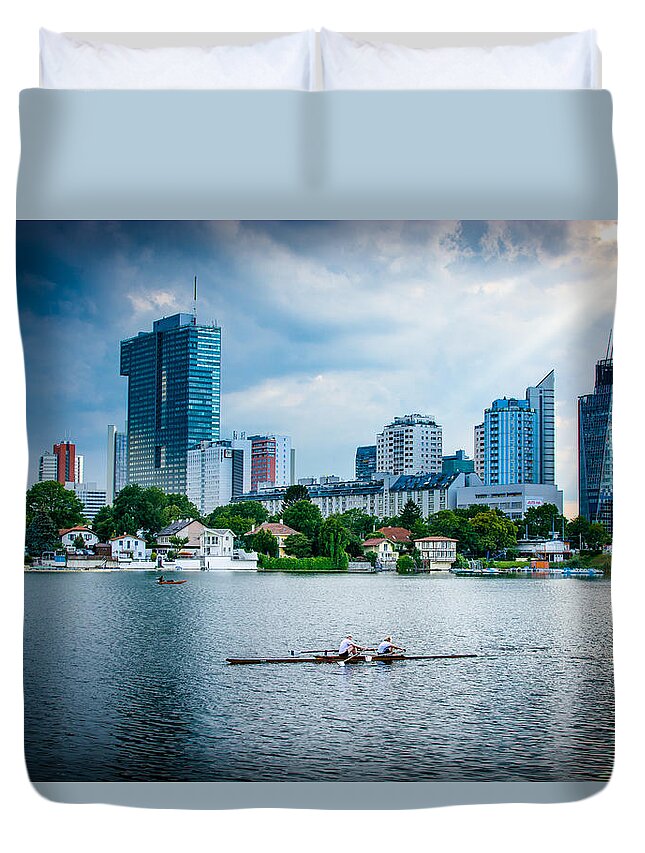 Skyline Duvet Cover featuring the photograph Rowing Boat And The Skyline Of Vienna by Andreas Berthold