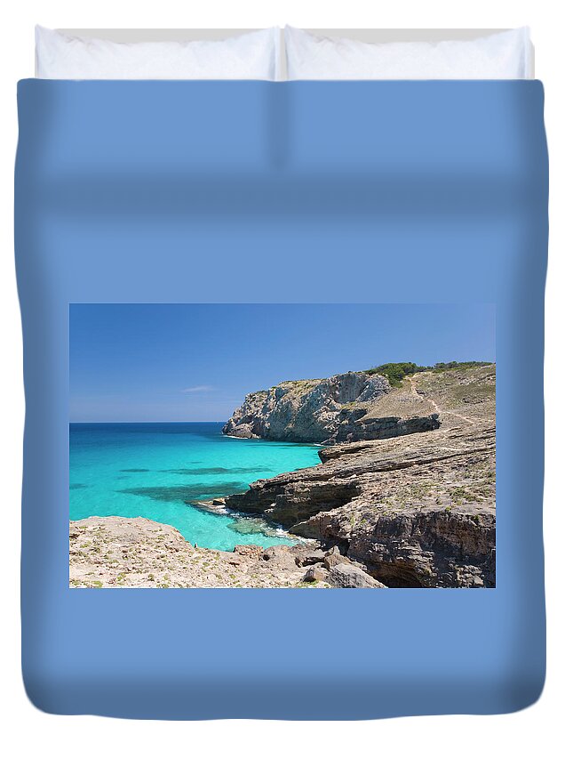Tranquility Duvet Cover featuring the photograph Rugged Coast North-west Of Cala Matzoc by David C Tomlinson