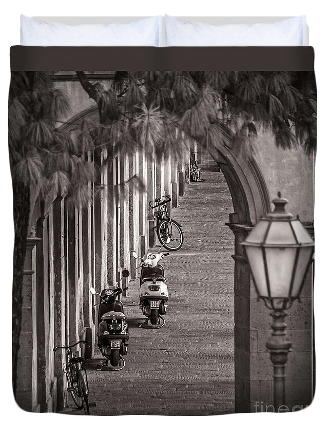 Lucca Duvet Cover featuring the photograph Scooters and Bikes by Prints of Italy