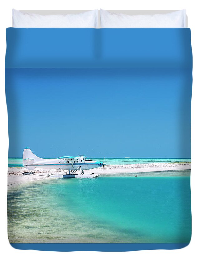 Clear Sky Duvet Cover featuring the photograph Sea Plane On A Tropical Island by Boogich