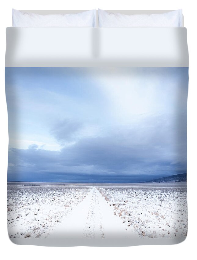 Snow Duvet Cover featuring the photograph Snow-covered Desert Track by Adrian Studer