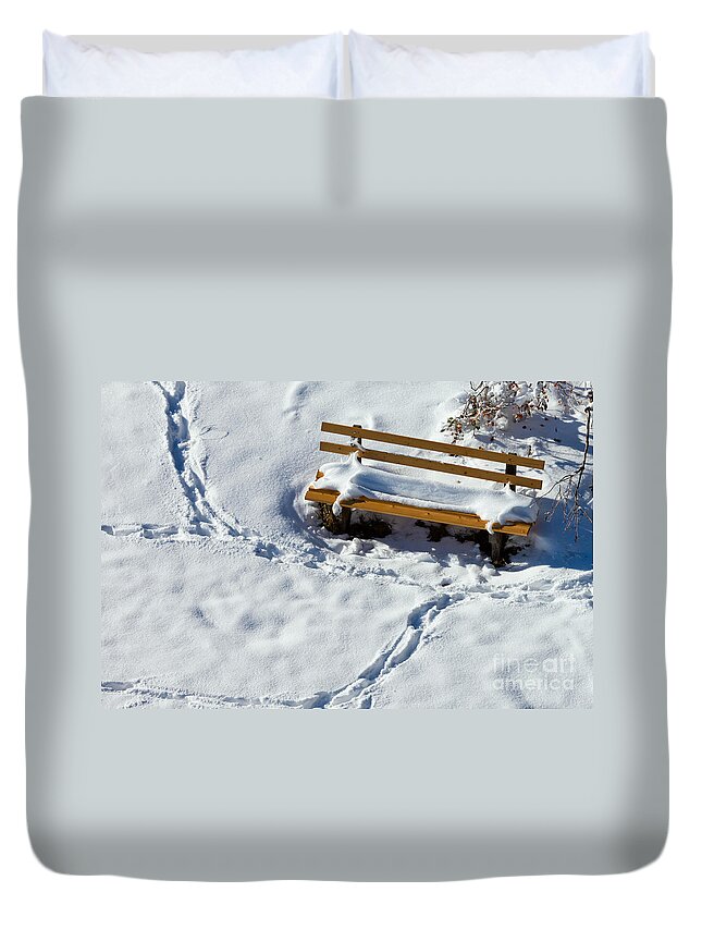 Background Duvet Cover featuring the photograph Snowy foot prints around snow covered park bench by Stephan Pietzko