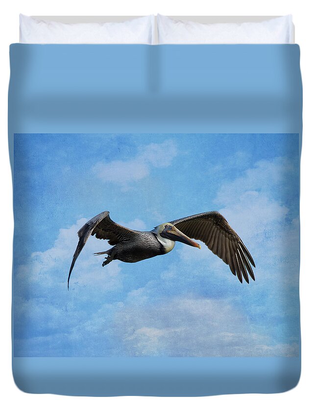 Pelican Duvet Cover featuring the photograph Soaring By by Kim Hojnacki