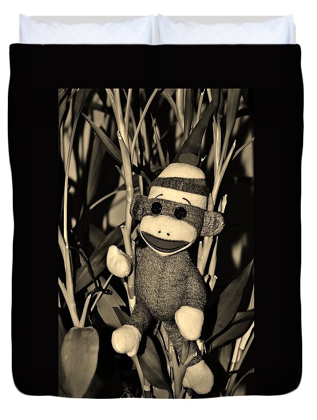Monkey Duvet Cover featuring the photograph SOCK MONKEY in HIS NATURAL HABITAT in SEPIA by Rob Hans