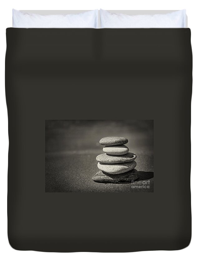 Rock Duvet Cover featuring the photograph Stacked pebbles on beach by Elena Elisseeva