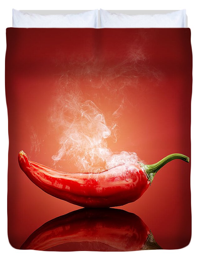 Chillichiliredsmokesmokinghotburnburningsteamsteamingcapsicumcayennejalapenopaprikapeppergradientbackgroundreflectionreflectivetablestudioshotvegetablefreshconceptconceptualstilllifefoodripeimageonenobodyphotographindoors001019xs Duvet Cover featuring the photograph Steaming hot Chilli by Johan Swanepoel
