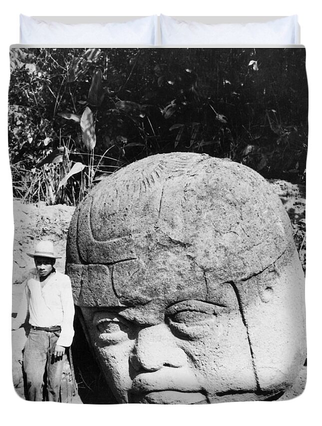 1 Person Duvet Cover featuring the photograph Stone Heads Found In Mexico by Underwood Archives