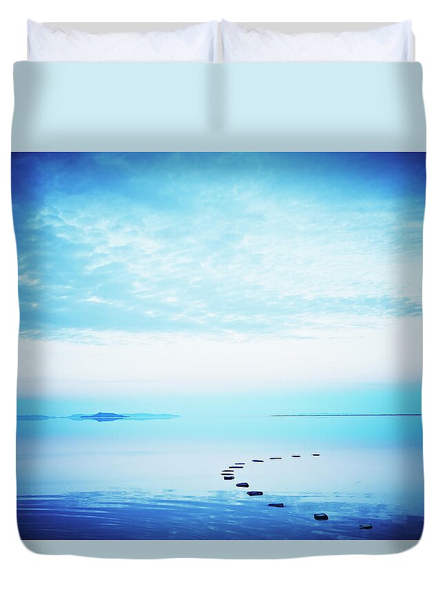 Scenics Duvet Cover featuring the photograph Stone Path In Calm Lake At Sunset by Thomas Barwick