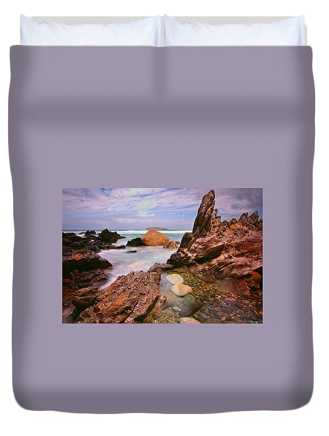 Tranquility Duvet Cover featuring the photograph Stone Spires And The Sea by Edmund Khoo Photography