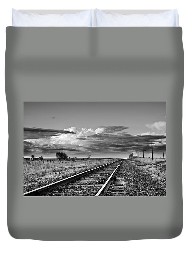 Black And White Duvet Cover featuring the photograph Storm Cloud above Rail Road Tracks by Eric Benjamin