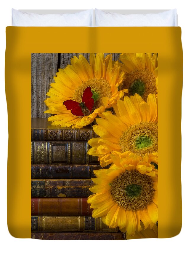 Sunflowers Duvet Cover featuring the photograph Sunflowers and old books by Garry Gay