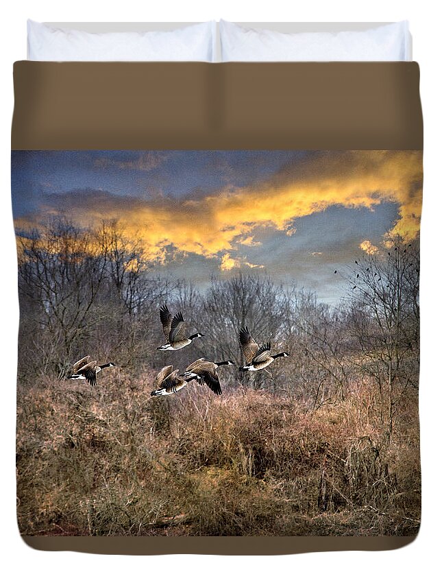 Sunset Duvet Cover featuring the photograph Sunset Geese by Christina Rollo