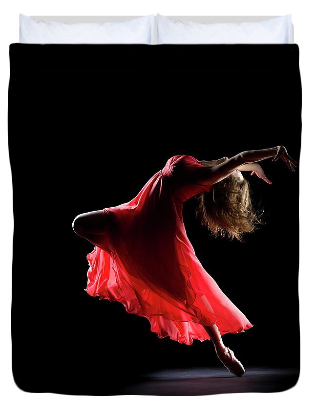 Ballet Dancer Duvet Cover featuring the photograph The Dancer On Black Background by Proxyminder