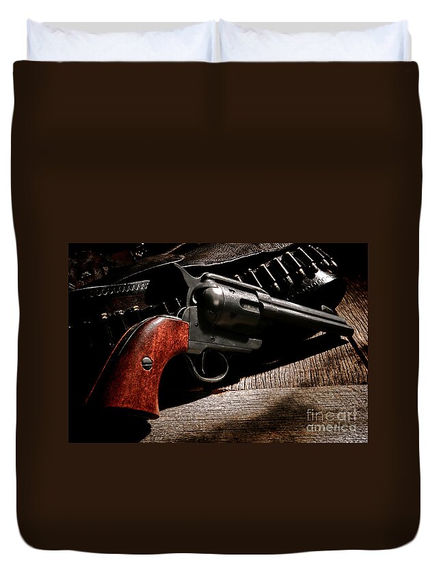 Revolver Duvet Cover featuring the photograph The Gun that Won the West by Olivier Le Queinec