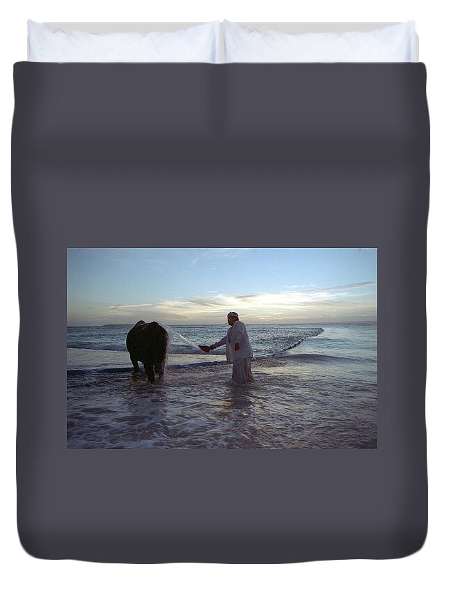 Water's Edge Duvet Cover featuring the photograph The Man And His Friend by Gen Umekita